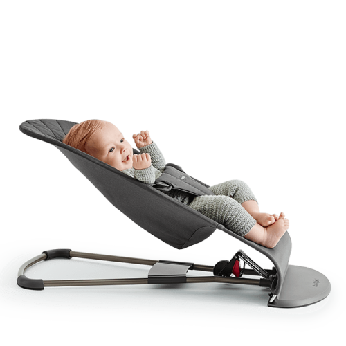 Leżaczek Bliss piaskowy szary+zabawka BabyBjorn