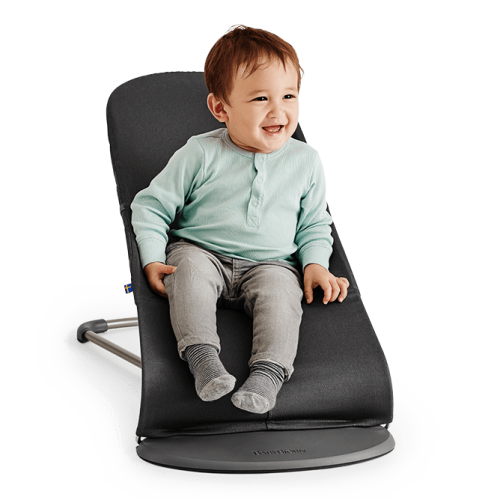 Leżaczek Bliss piaskowy szary+zabawka BabyBjorn